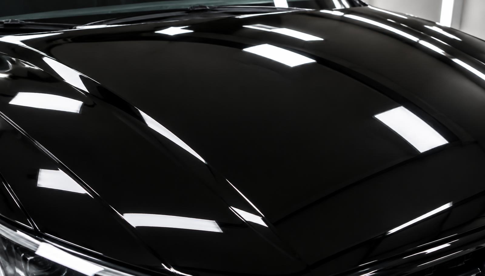 Glossy, reflective black paint after detailing